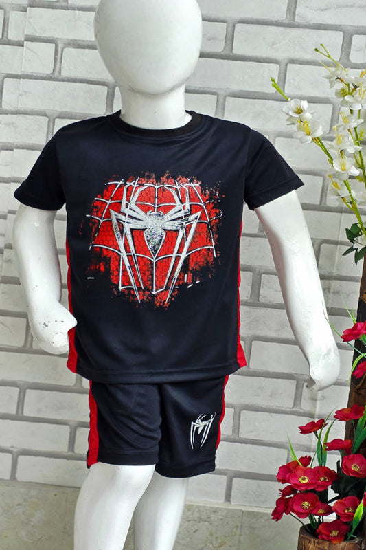 Black t-shirt with red and white graphic design on a mannequin against a brick wall.