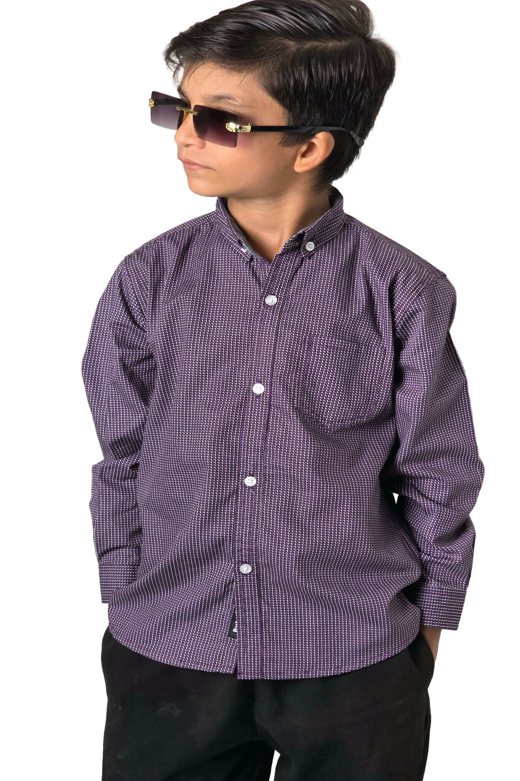 Child wearing a purple checkered shirt and sunglasses against a white background