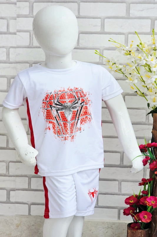 Mannequin wearing a white outfit with red accents against a brick wall.
