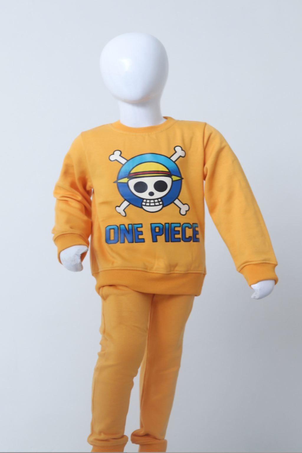 Yellow 'One Piece' themed outfit on a mannequin against a white background