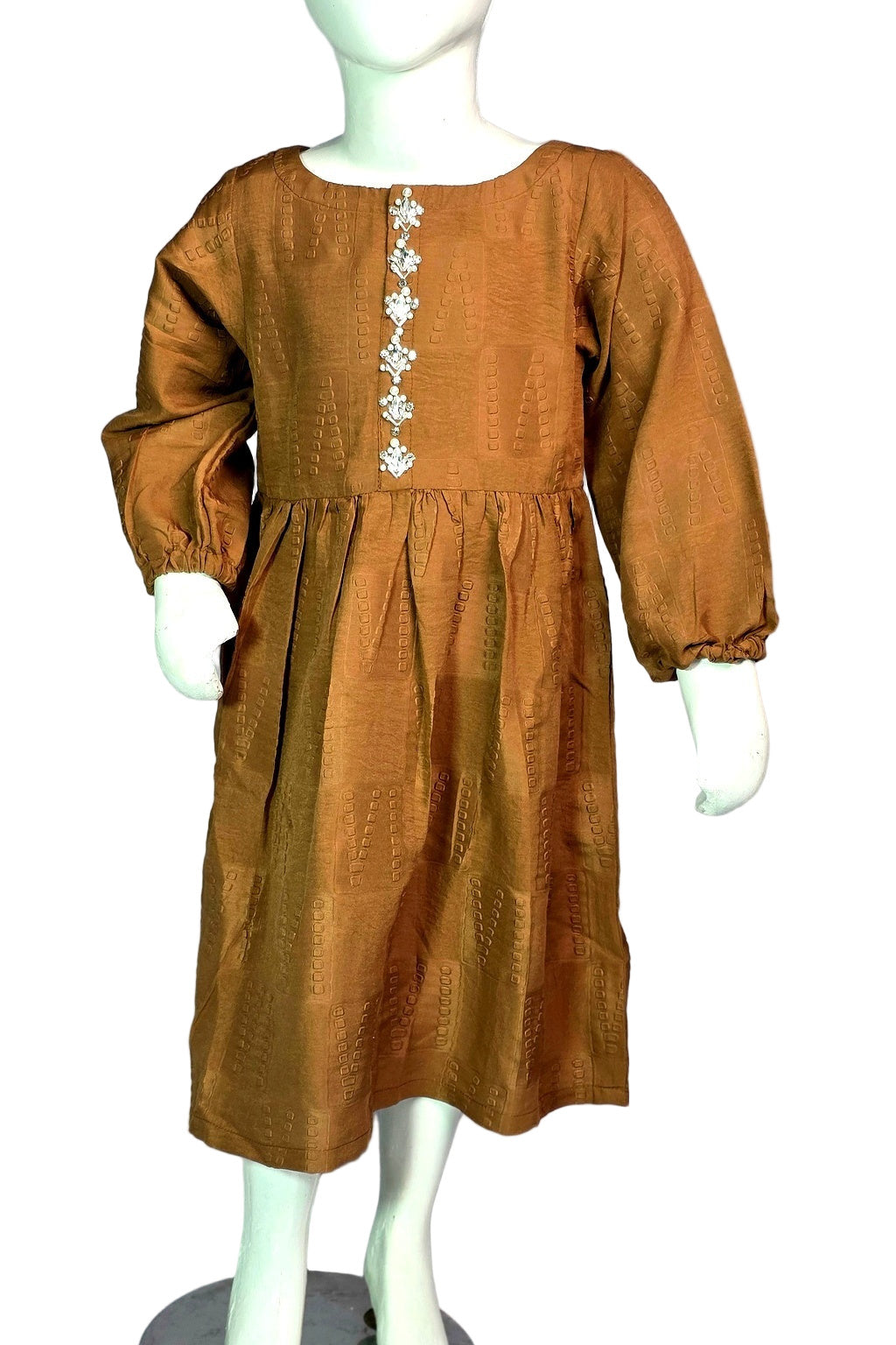 Brown dress with floral embellishments on a mannequin against a gray background