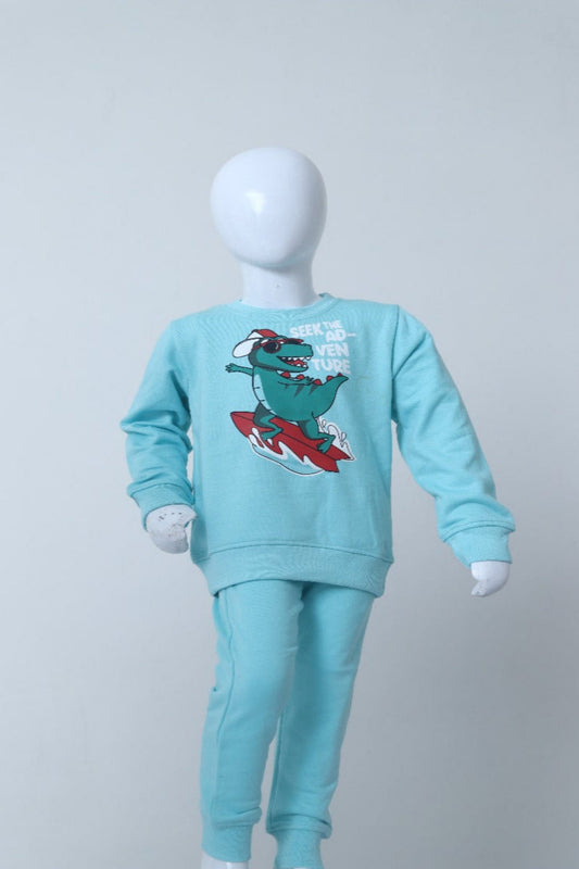 Turquoise pajama set with a dinosaur design on a mannequin against a white background