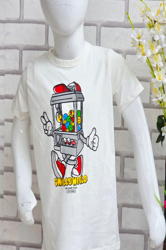 White t-shirt with a cartoon gumball machine design on a mannequin against a light gray brick wall.